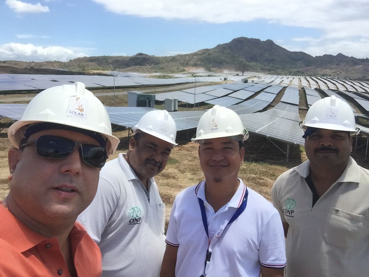 KP with team at a solar installation site